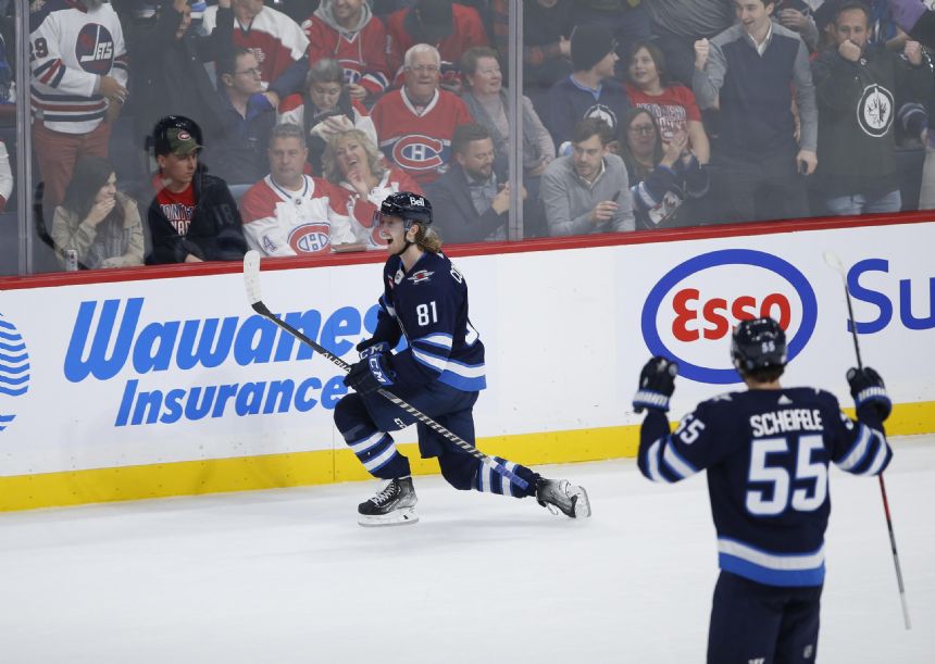 Connor scores in OT, Jets beat Canadiens 3-2