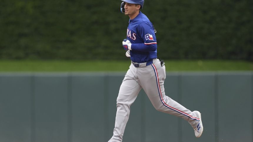 Corey Seager homers twice as the Rangers beat the Twins 6-2