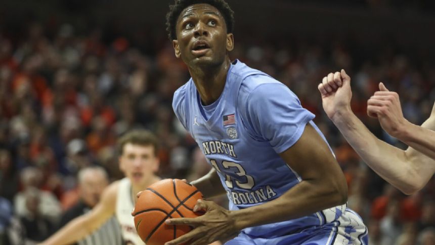 Cormac Ryan scores 18 and No. 10 North Carolina finally wins at Virginia, 54-44