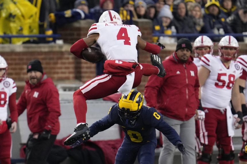 Corum runs for 162 yards, No. 3 Michigan beats Nebraska 34-3