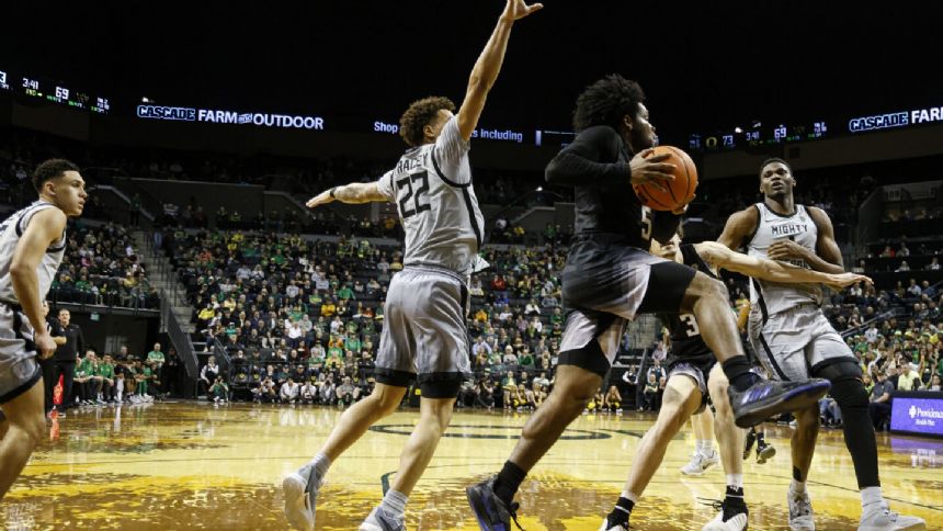 Couisnard scores 27, Oregon makes free throws in last minute to hold off Washington 85-80