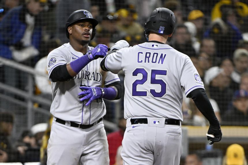 Cron, Rockies rain homers on Padres for 7-2 opening win