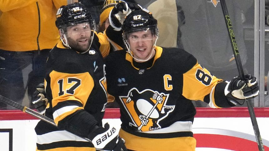 Crosby collects 4 points as Penguins hold off rival Philadelphia in wild 7-6 win