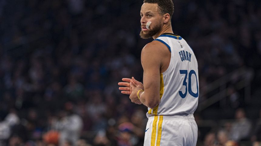Curry has 31 points and 11 rebounds, leads Warriors to 110-99 victory over Knicks