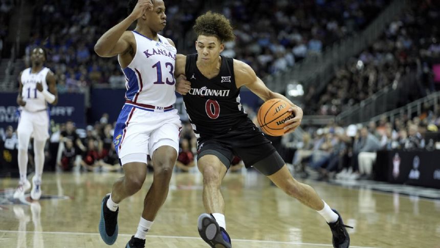 Dan Skillings Jr. scores 25, Cincinnati beats short-handed No. 16 Kansas 72-52 in Big 12 Tournament