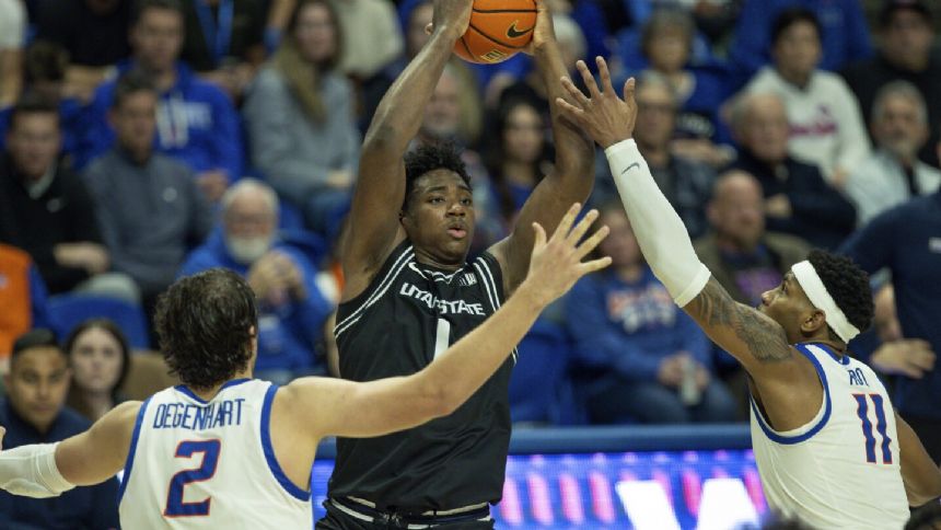 Darius Brown II leads No. 18 Utah State over Boise State in overtime