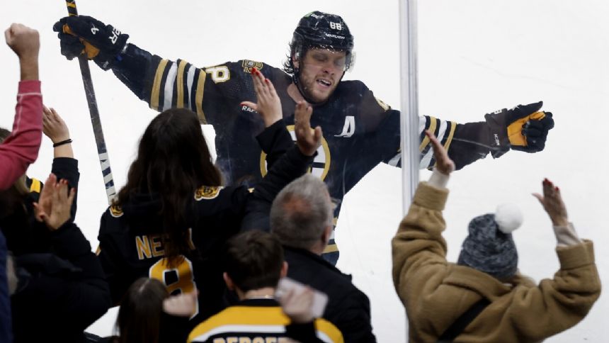 David Pastrnak and Kevin Shattenkirk each score twice to lift Bruins over Devils 5-2