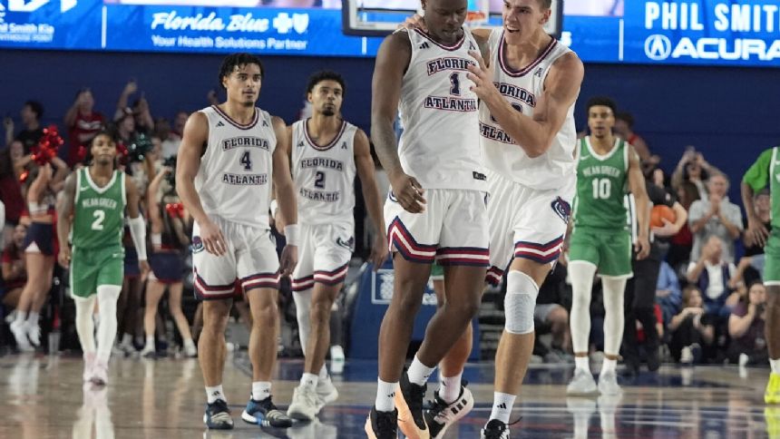 Davis hits a 3-pointer at the end and No. 22 FAU holds off North Texas 66-63