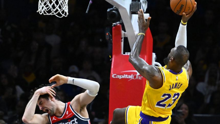 Davis leads Lakers to their 8th win in 9 games, scores 35 points in 125-120 victory over Wizards