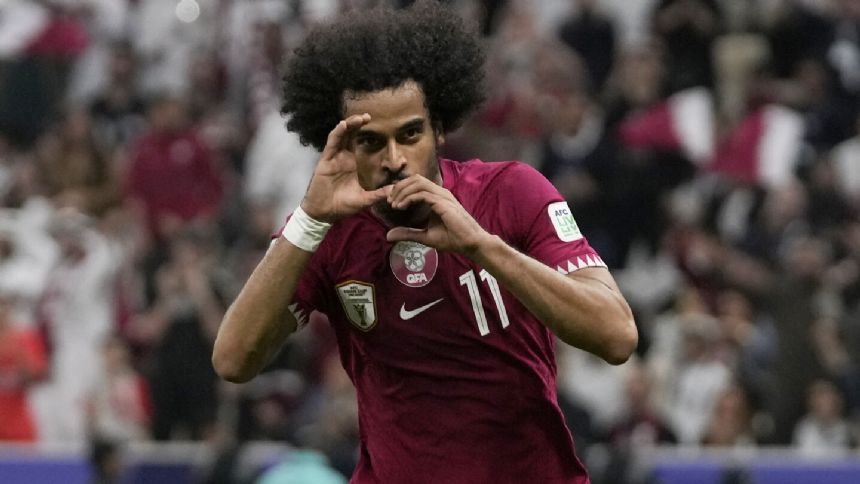 Defending champion Qatar beats Lebanon 3-0 in perfect start for Asian Cup host nation