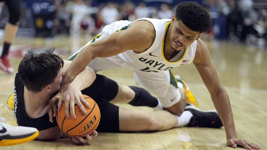 Dennis, Bridges help No. 14 Baylor pull away from Cincy for 68-56 Big 12 tourney win