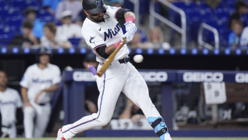 Derek Hill's grand slam, Bellozo's strong start help Marlins to hold off Reds 6-4