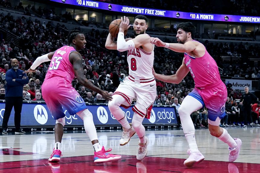 DeRozan, LaVine combine for 56, Bulls zoom past Wizards