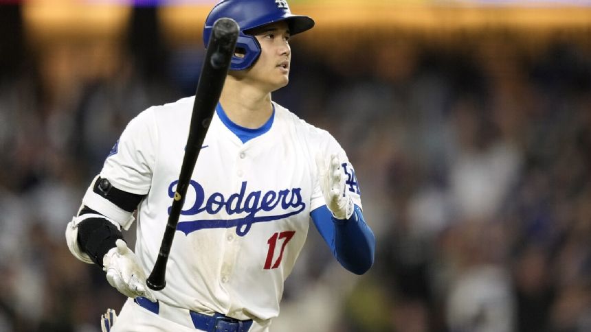 Dodgers blast 4 homers during 7-run 6th inning against Rangers