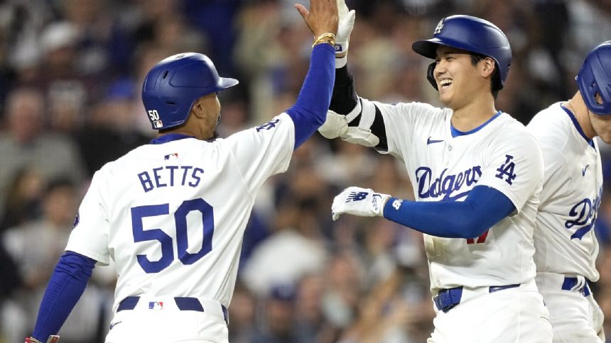 Dodgers blast 5 homers -- 4 in 6th inning -- in 15-2 rout of World Series champion Rangers