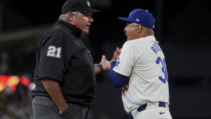 Dodgers' Dave Roberts ejected in 6th after interference call at third base