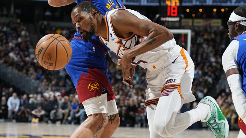 Durant erupts in OT, leads Suns to 117-107 win over Nuggets after blowing 22-point lead