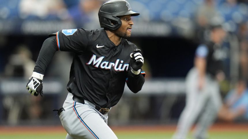 Edwards drives in three runs, Burger and Bride homer to help Marlins beat Rays 6-2