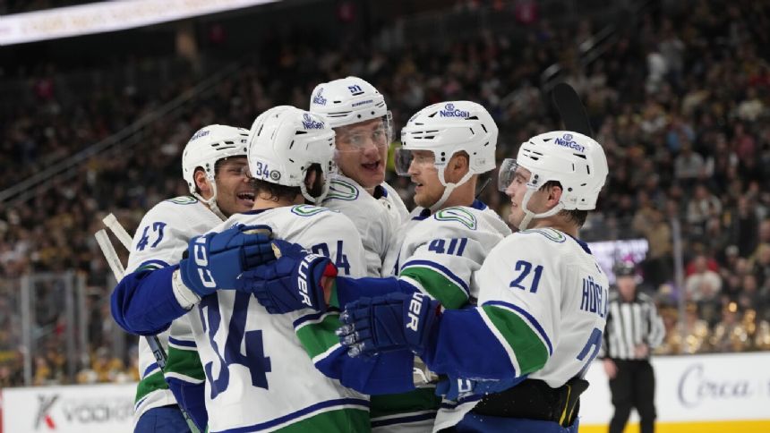 First-place Canucks hand struggling Golden Knights 3-1 loss