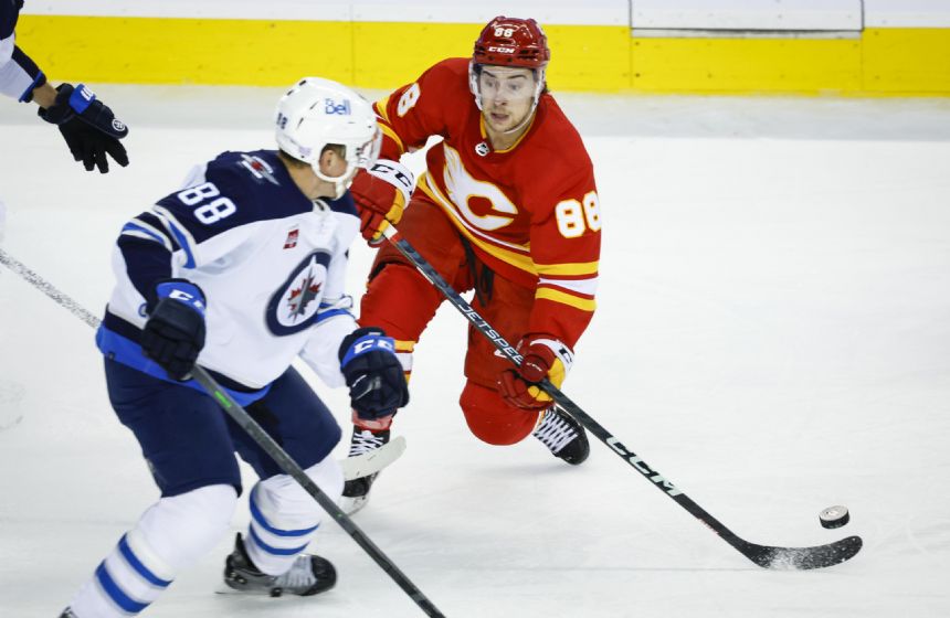 Flames beat Jets 3-2 to end 7-game skid