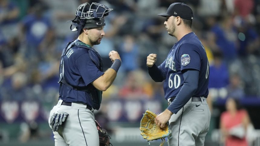 France's 10th-inning single lifts Mariners over Royals 10-8 after blown 7-run lead