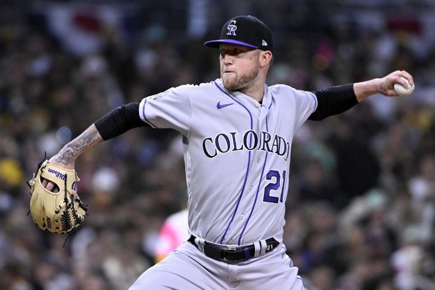 Freeland's great play, Blackmon HR carry Rockies past Padres