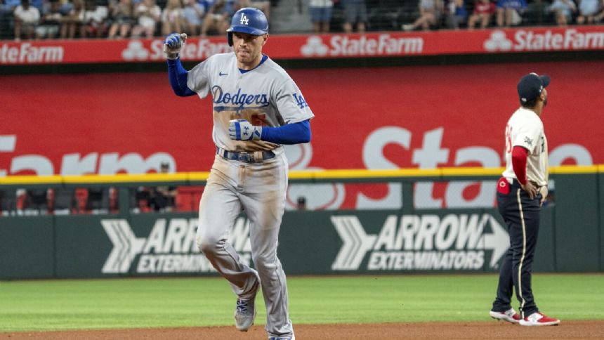 Cody Bellinger drives in 4 runs as the Cubs top the Cardinals 8-6 on a  rainy day at Wrigley