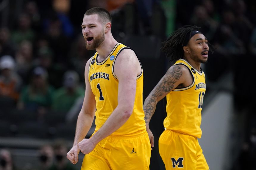 Freshman Collins leads Michigan past Colorado State 75-63