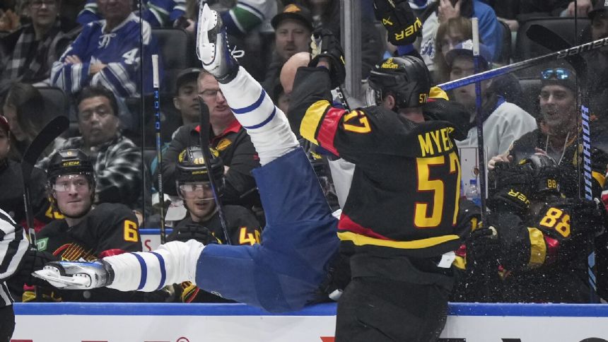 Garland, Hoglander Each Score Twice, NHL-leading Canucks Beat Maple ...