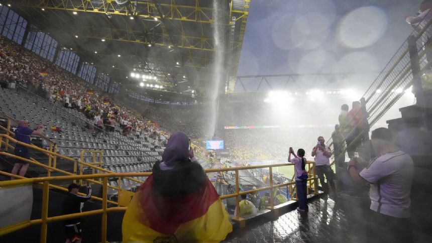 Germany's game with Denmark resumes at Euro 2024 after thunderstorm