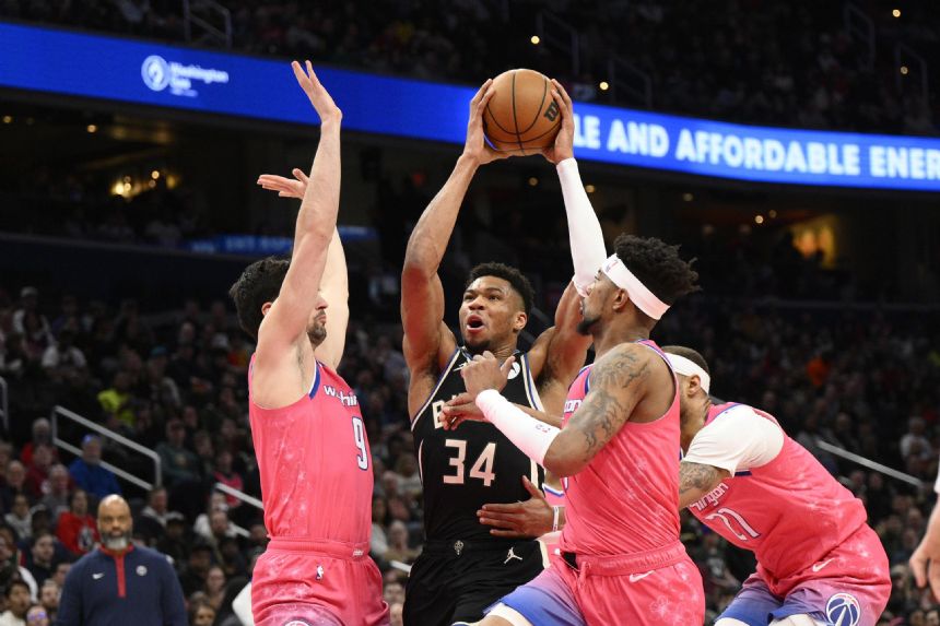 Giannis triple-double helps Bucks outlast Wizards 117-111