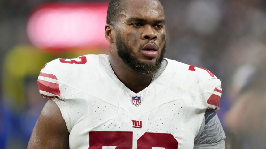 Giants still waiting for right tackle Evan Neal to practice in training camp after ankle surgery