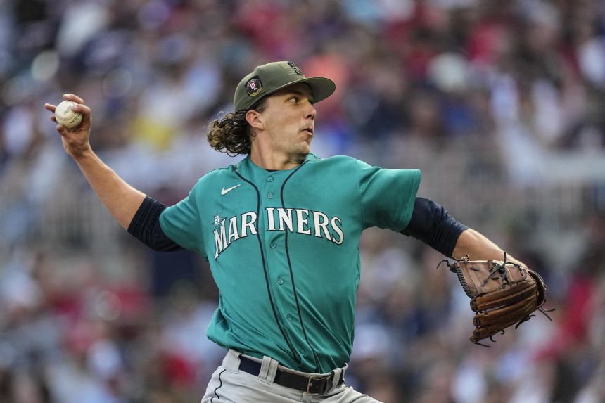 Gilbert records 15 straight outs, Mariners overpower Braves, 7-3