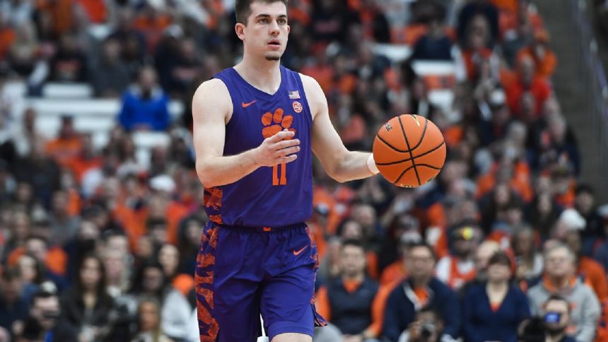 Girard reaches 2,000 career points, leads Clemson past Syracuse 77-68