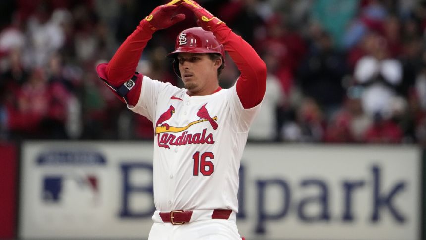 Gorman's 2-run double helps Cardinals win home opener, 8-5 over woeful Marlins, who drop to 0-8