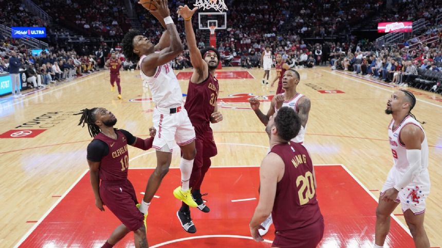 Green scores 26 points as Rockets beat Cavaliers 117-103 for their fifth straight victory