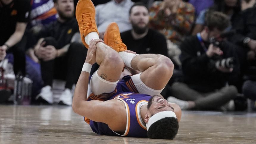 Green, VanVleet lead Rockets past Suns, 118-109. Phoenix star Booker injures ankle