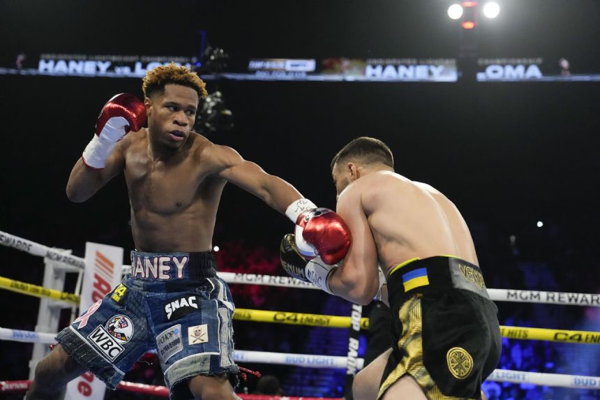 Haney retains lightweight titles with unanimous decision over Lomachenko