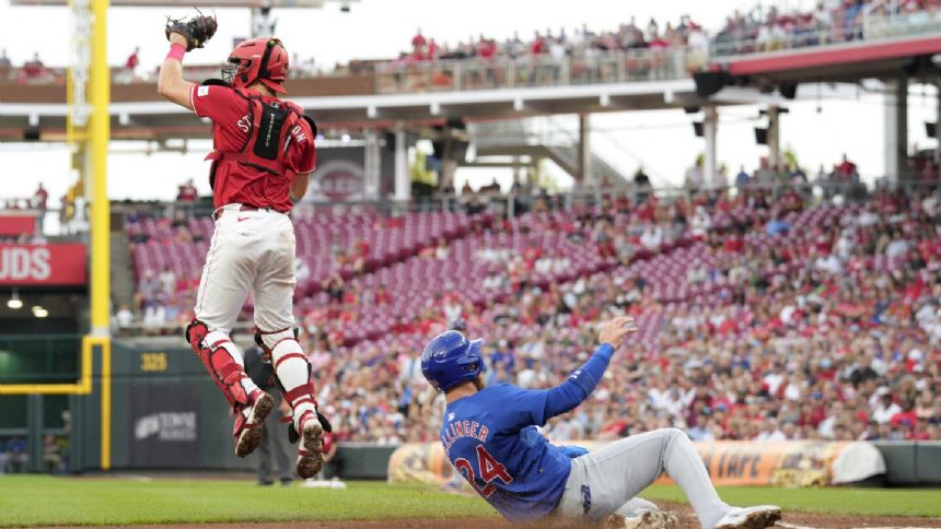 Happ launches 2-run homer and Cubs pound out 17 hits in 13-4 rout of Reds