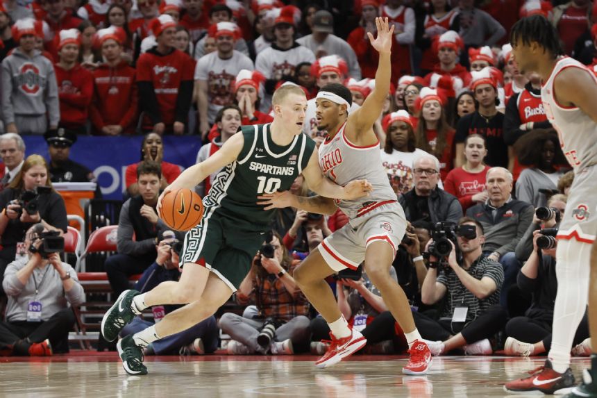 Hauser, Michigan State deal Ohio State 6th loss in row 62-41