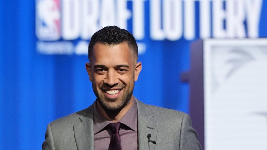 Hawks GM Landry Fields is taking trade calls but insists he plans to keep No. 1 pick in NBA draft