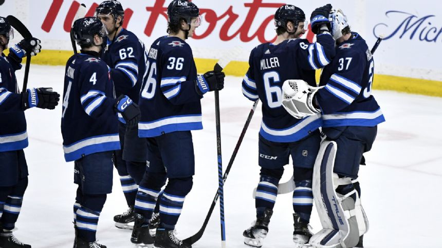 Hellebuyck gets fourth shutout of season as Jets beat Capitals 3-0