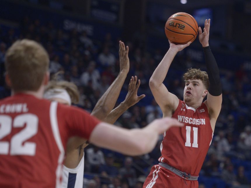 Hepburn scores 19, Wisconsin tops Penn State 79-74 in OT