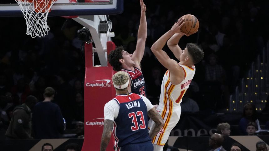 High-scoring Hawks rout Washington 136-108, handing the Wizards their 9th straight loss