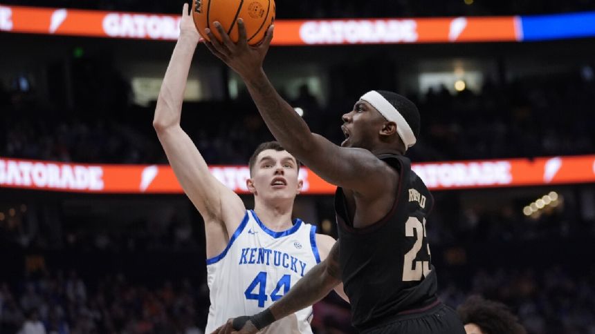 High-scoring Kentucky aims to prove during March Madness that it also defends, despite the stats