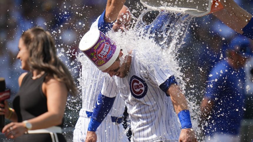 Hoerner's bases-loaded walk in the 10th gives the Cubs a 2-1 victory over the Diamondbacks