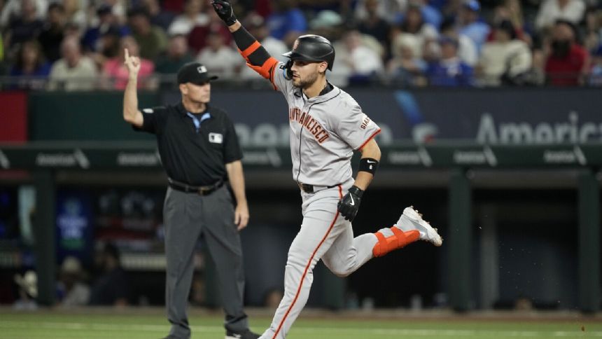 Homers by Conforto and Flores help lead Giants past Rangers 5-2