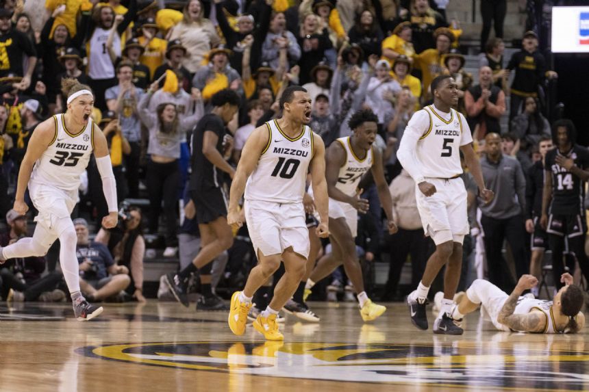 Honor's 3 lifts Missouri past Mississippi St. 66-64 in OT