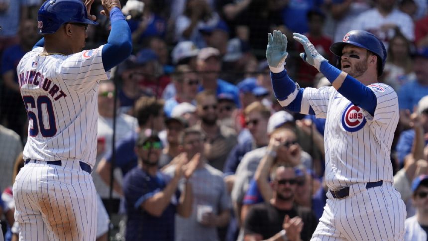 Ian Happ and Michael Busch homers power Cubs past Twins 8-2