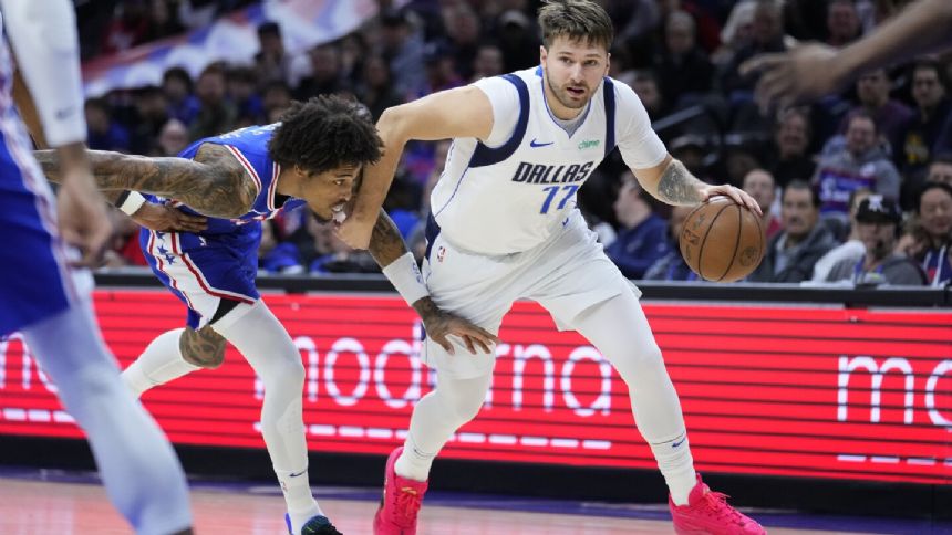 Irving, Doncic power Mavericks past 76ers without injured Embiid, 118-102